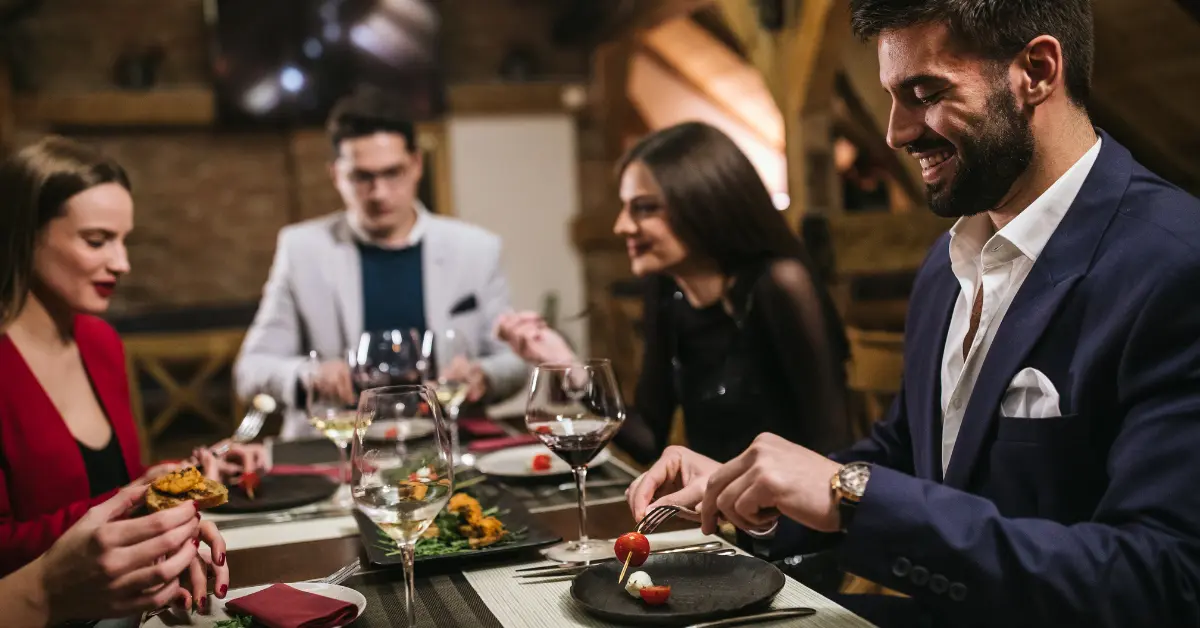 Business executives dining together